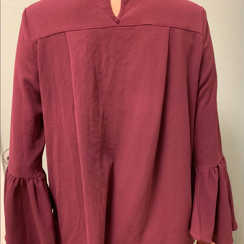 Maroon blouse with neck cut out
